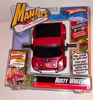 Front view of sealed Hot Wheels Maniacs Rusty Wheels interactive toy showing car and graphics