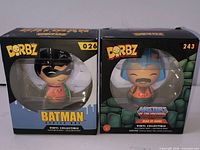 Front view of both sealed Funko Dorbz boxes