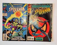 Front covers of both Spectacular Spider-Man issues showing titles, issue numbers and cover art