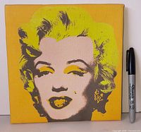 Front of square printed canvas showing Marilyn Monroe portrait
