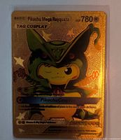 Front view of gold foil Pikachu Mega Rayquaza TAG COSPLAY card in sleeve