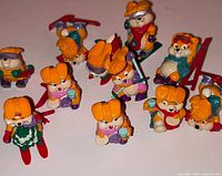 Group shot of eleven Ski Bunnies figurines on white background