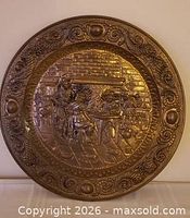 Full view of copper wall plate showing tavern scene and decorative border