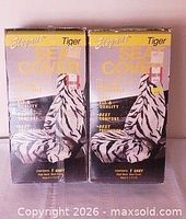 Front view of two Elegant Tiger seat cover boxes