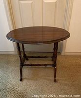 Full view of oval side table front angle