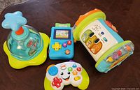 All four toys grouped on table