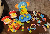 All toys laid out on coffee table showing quantity and variety