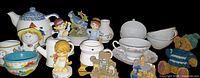 Full view of all porcelain pieces, figurines and miniature houses