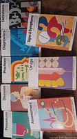 All eight Nurse's Reference Library volumes displayed face up