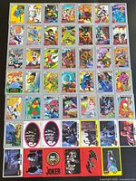 Full lot layout of 48 DC Comics trading cards