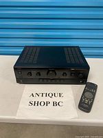 Amplifier front view with remote control