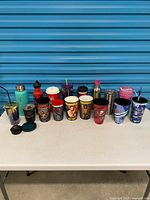 Entire lot lined up showing all drinkware pieces