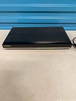 Front and top view of Samsung DVD-C350 player