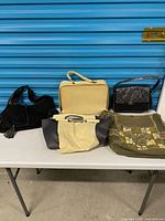 Group shot of five bags on table