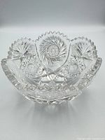 Overall view of cut crystal bowl showing starburst and sawtooth rim