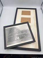 Front view of both frames, size comparison and contents