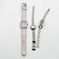 Front view of all three wristwatches side by side