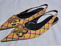 Top view of both slingback flats displaying plaid pattern and gold BB hardware