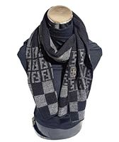 Scarf draped on mannequin showing pattern and label