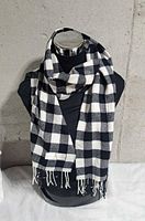 Scarf displayed on mannequin showing overall appearance and drape