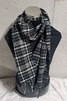 Scarf draped on mannequin showing pattern and drape