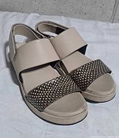 Top view of full pair showing strap design and overall condition