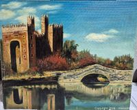 Full view of painting showing Bunratty Castle, bridge, river reflection