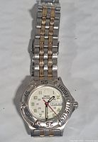 Front view showing dial, bezel, bracelet