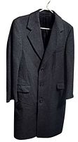 Front view of charcoal gray wool coat hanging, showing three-button front, notch lapel, pockets