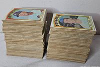 Two tall stacks of 1972 Topps cards front card Braves pitcher