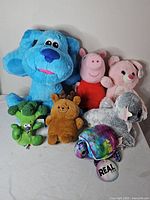 Group shot of all seven plush toys
