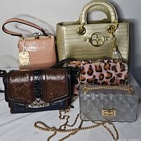 Group shot of all five handbags