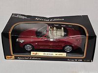 Front angled view of boxed Maisto Lexus SC 430 model