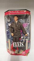 Front of boxed Mattel Elvis Presley The Army Years doll showing figure and branding