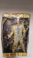 Front view of boxed Elvis Presley doll