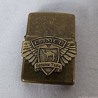 Front view showing Camel Genuine Taste emblem