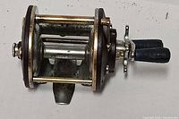 Left side view showing side plate, handle, star drag