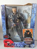 Front view of boxed Wolverine figure showing figure, accessory and branding