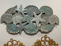 Frontal view of entire mosaic glass seashell wall decor