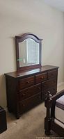 Front view of dresser with attached mirror