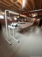 Full view of Grace Continuum II frame with overhead lights in basement