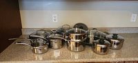 Full view of all cookware pieces grouped on counter