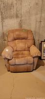 Front view of light brown faux suede recliner