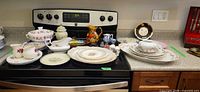 Overview of all china pieces on stovetop