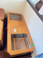 Top view showing glass panels and starburst oak veneer pattern