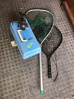 Full lot: tackle box, reel on top, two landing nets