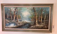 Full view of framed oil painting on wall
