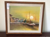 Full view of framed harbour oil painting