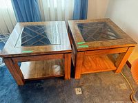 Both matching square accent tables side by side, showing tops and shelves