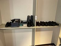 Shelf view showing all nine pairs, two boxes visible